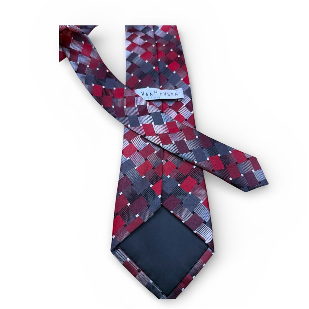 Van Heusen Men’s necktie featuring a red,gray, and black geometric pattern